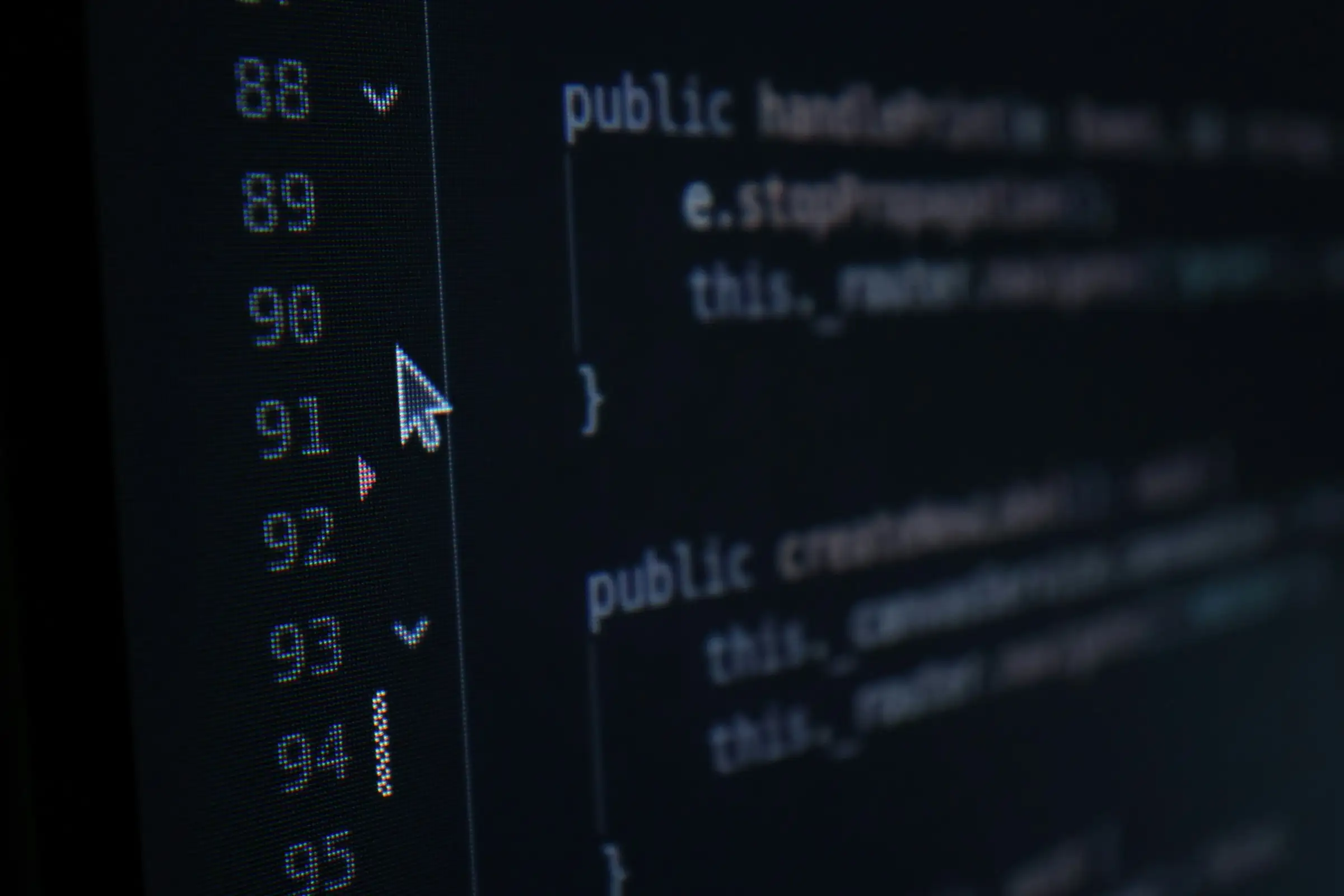 Close-up of source code with line numbers on a dark screen